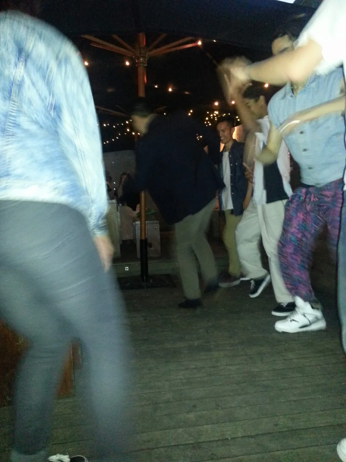 Dancing in the courtyard at Ching-a-Lings Sunday Sessions, caught in motion blur
