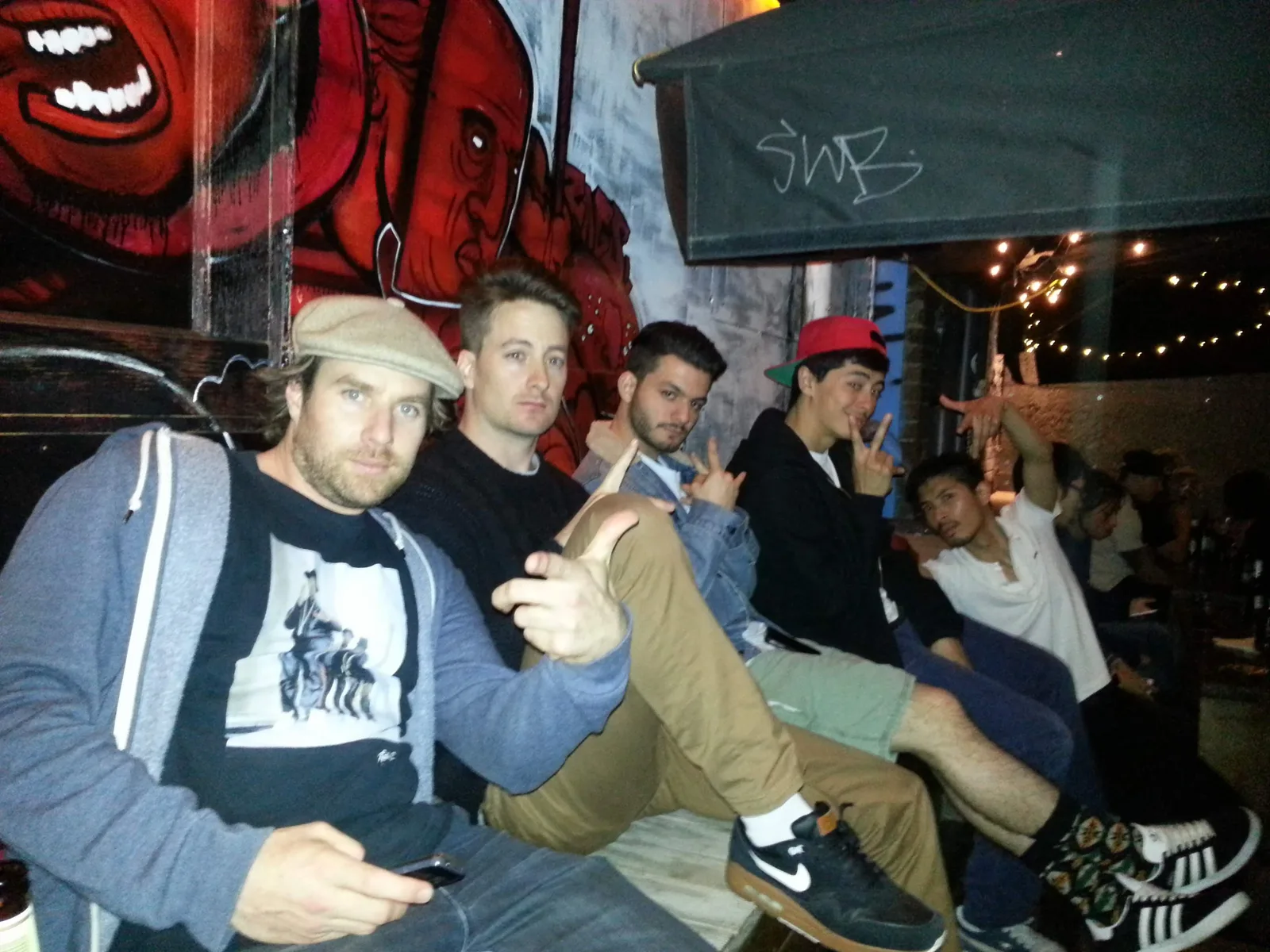 Group sitting on an outdoor couch at Ching-a-Lings Sunday Sessions