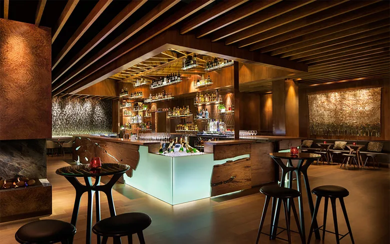 The backlit bar at Grain Bar, Four Seasons Hotel Sydney, where DJ CMAN held a Friday residency