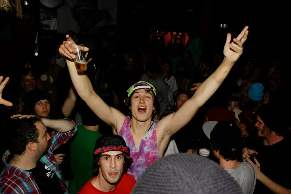 Hands in the air on a crowded dancefloor at the snow jam