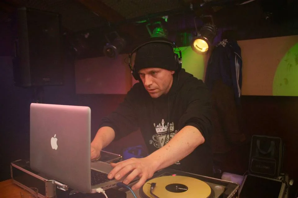 A DJ working the laptop and mixer during the Hijack Party