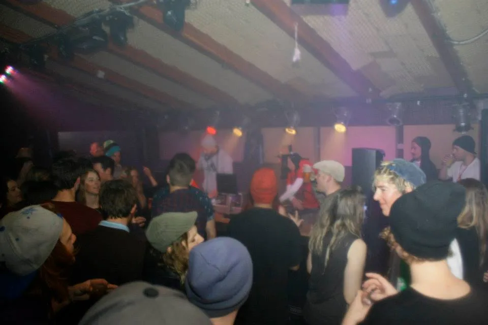 A wide shot of the packed room at the Hijack Party