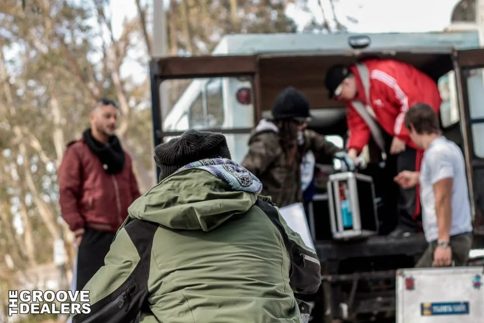 The Groovedealers crew outdoors with their gear during the 2014 snow tour