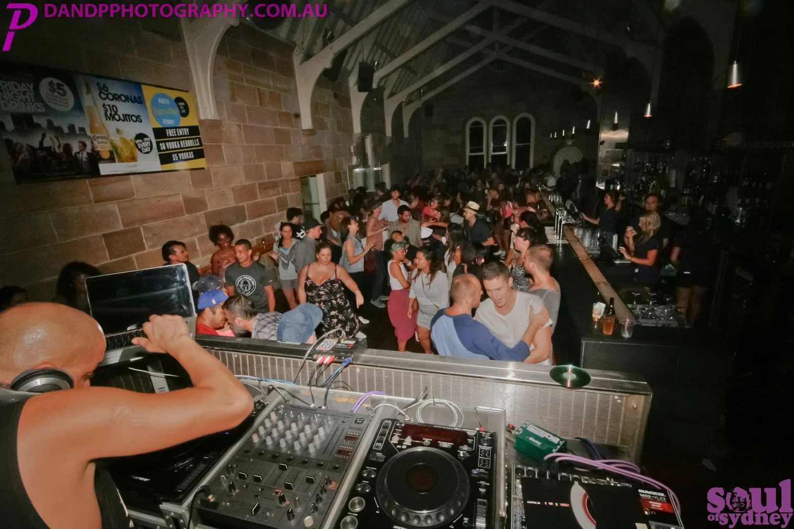A packed crowd under a high brick ceiling at the Soul of Sydney block party
