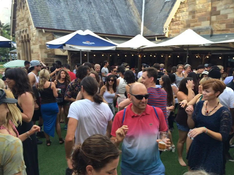 A daytime crowd filling the Greenwood Hotel courtyard in North Sydney