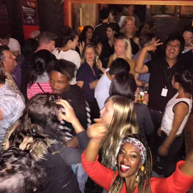 A packed crowd dancing at the Cafe Lounge Friday Sessions