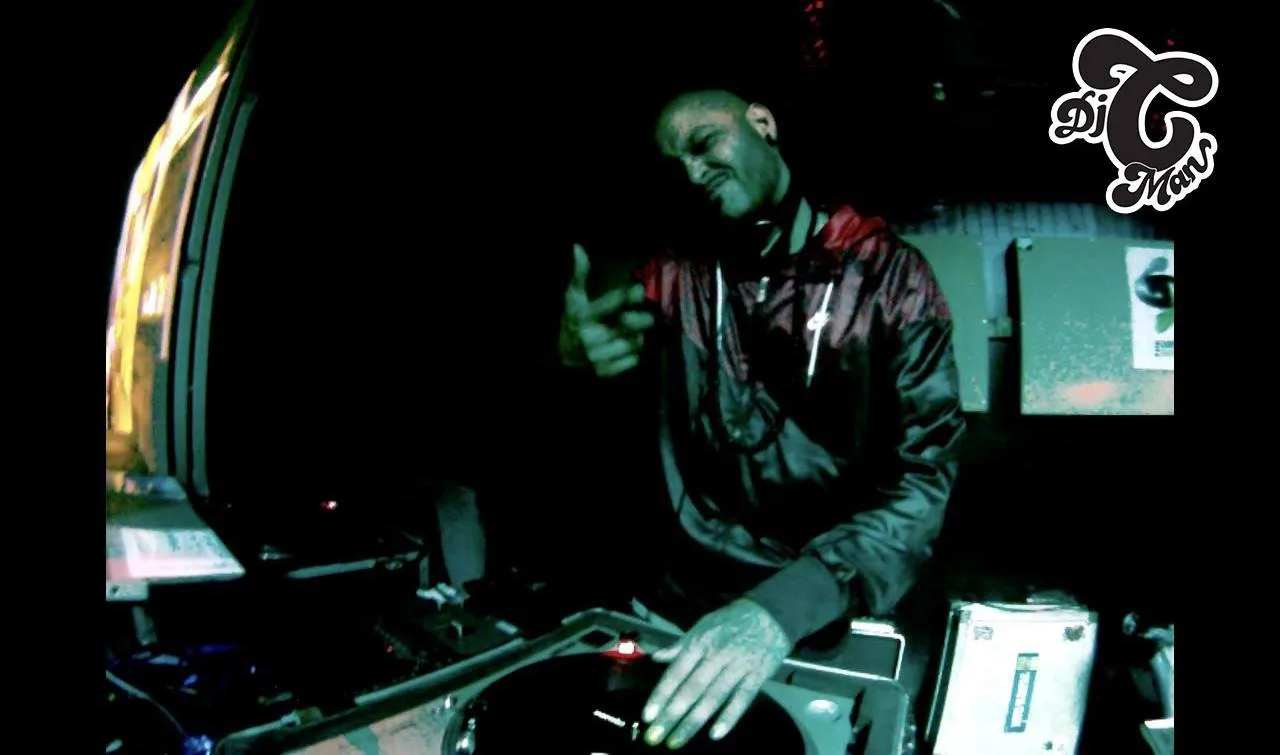 A DJ at the studio console during a radio set