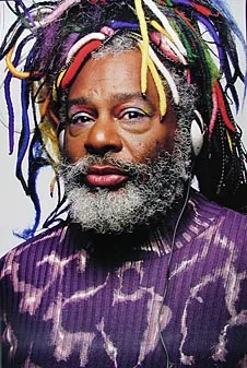 Portrait of a funk musician with multicoloured dreadlocks