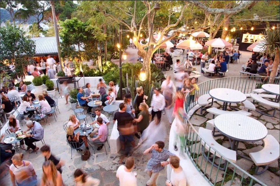 Outdoor tables and a busy crowd at the Newport