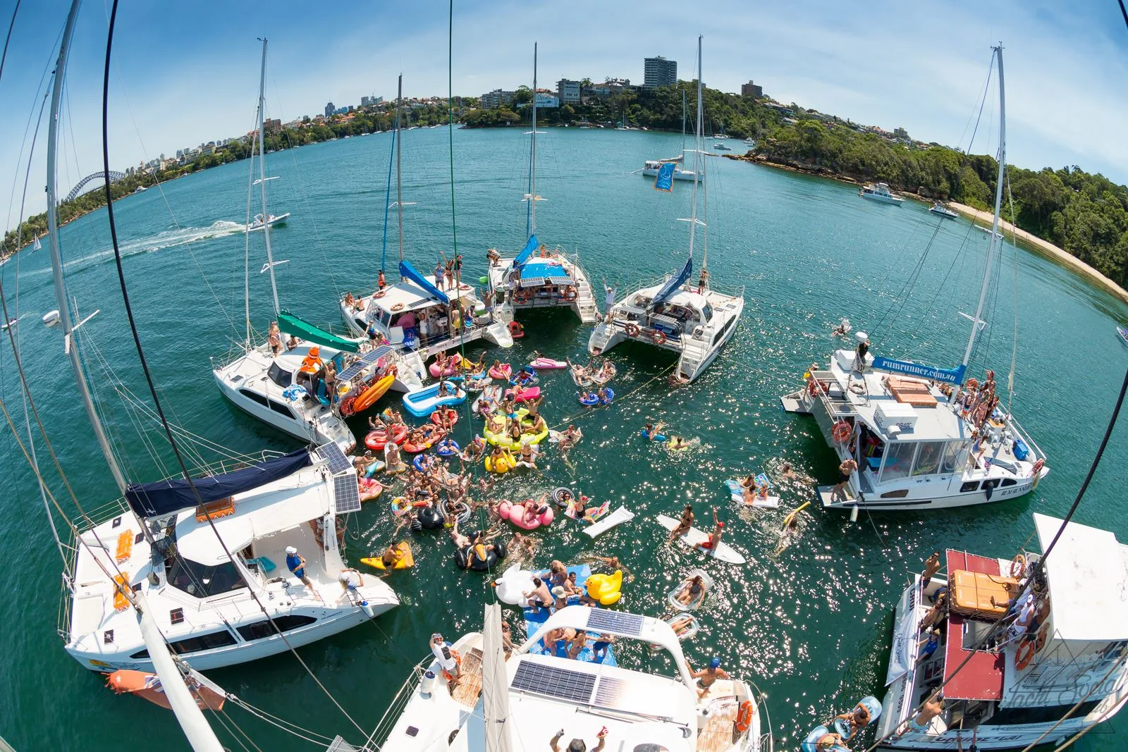 An aerial view of boats rafted together on the harbour