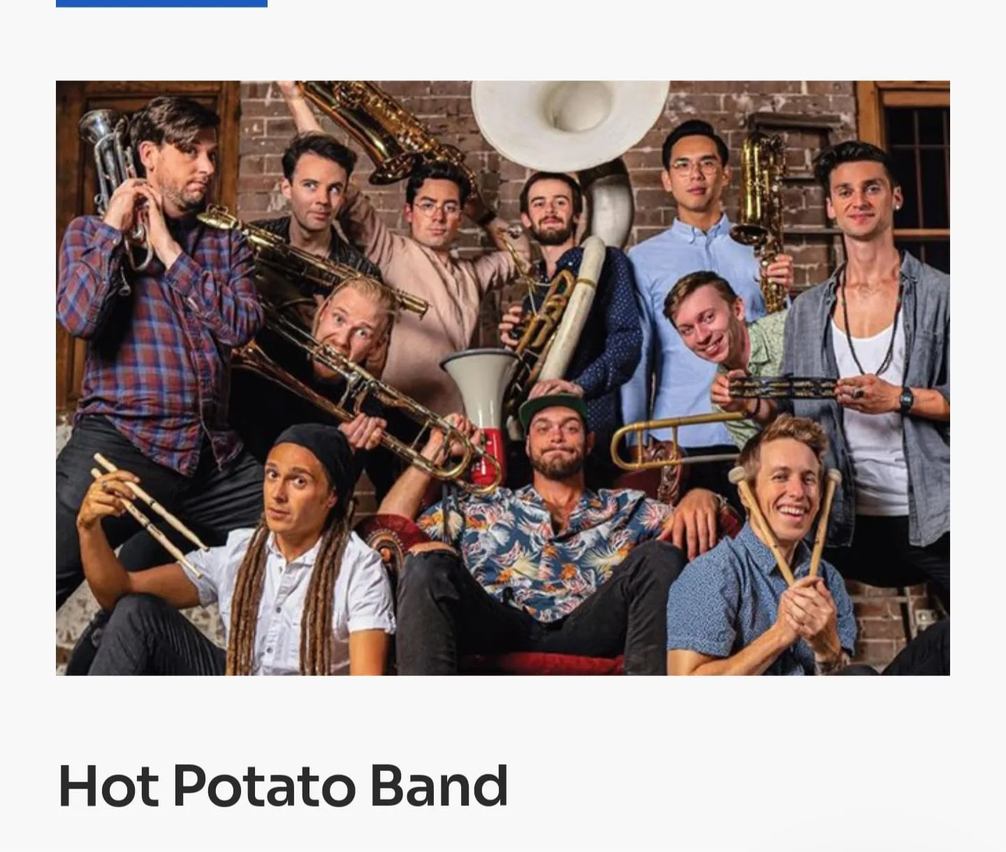 The Hot Potato Band gathered together for a group portrait