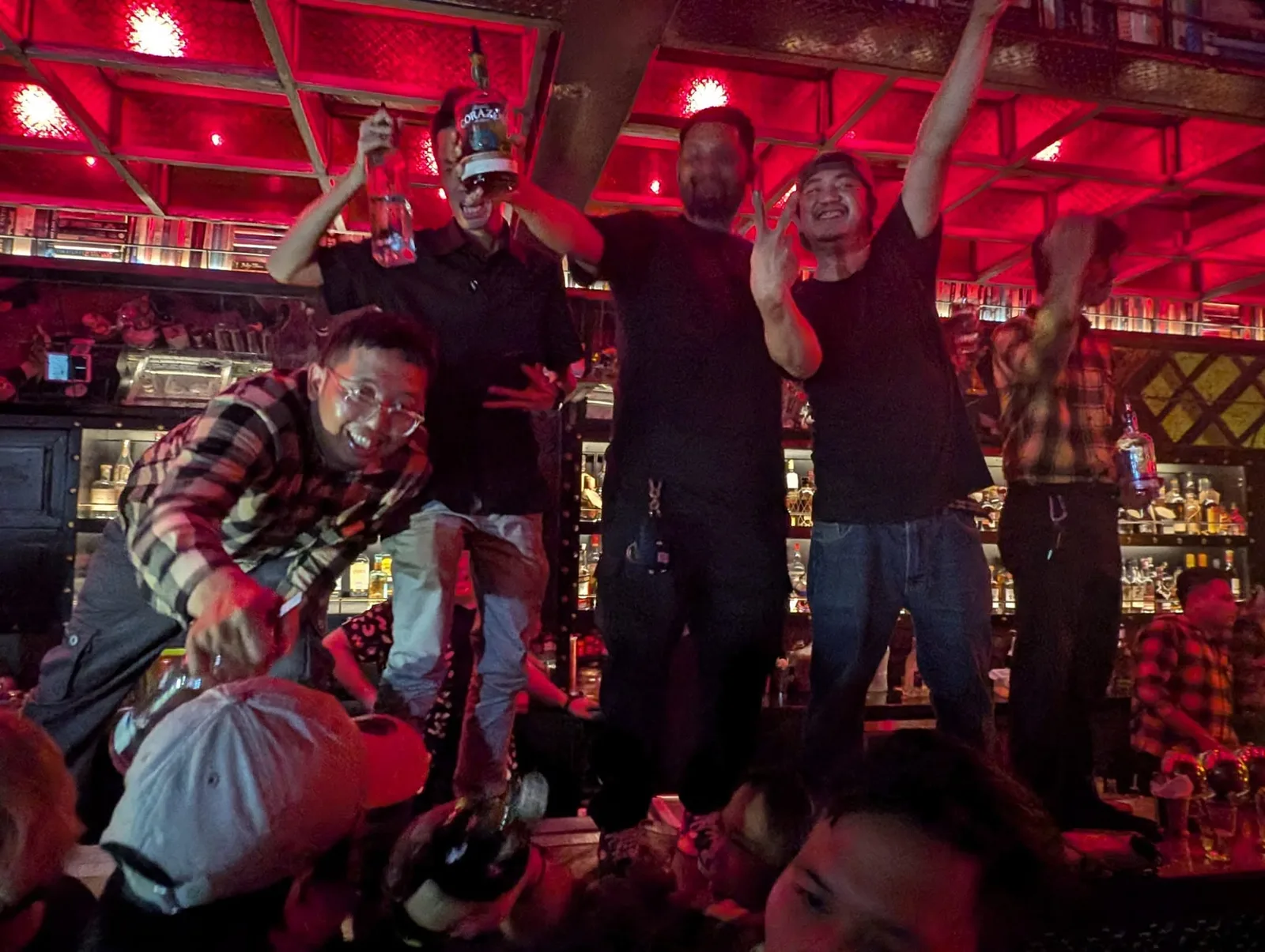 DJ CMAN and the crew up on the bar at 40 Thieves Bali closing party