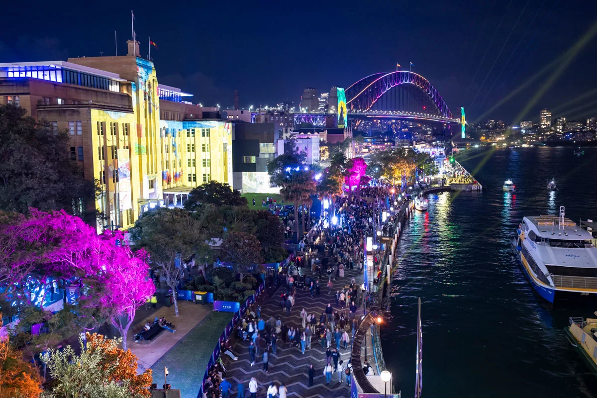 Crowd dancing to DJ CMAN at Vivid Sydney near The Rocks
